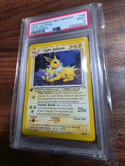 2002 POKEMON NEO DESTINY 1ST EDITION #48 LIGHT JOLTEON PSA 9 - Image 1