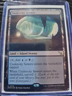 Undercity Sewers Murders at Karlov Manor Regular Card #270 Surveil Land MTG - Image 1