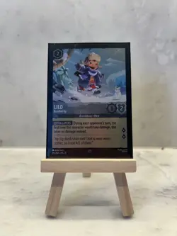 195/204 Lilo - Bundled Up - Winterspell - Super Rare - FOIL - Disney Lorcana - Image 1