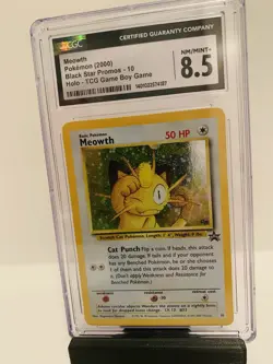 CGC 8.5 Near Mint/Mint + (2000) Pokemon Meowth Holo Black Star Promo - Image 1