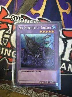 Yu-Gi-Oh! TCG Sea Monster of Theseus Raging Tempest RATE-EN081 Unlimited Secret - Image 1