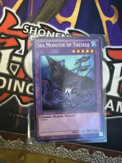 Yu-Gi-Oh! TCG Sea Monster of Theseus Raging Tempest RATE-EN081 Unlimited Secret - Image 2