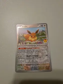 Pokemon Eevee TCG Reverse Cosmos Holo Card 074/131 Pokemon Day 2025 Stamp - Image 1