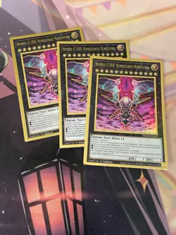 YUGIOH - NUMBER IC1000: NUMEROUNIUS NUMEROUNIA X3 - GOLD RARE - MGED - 1ST - NM - Image 1