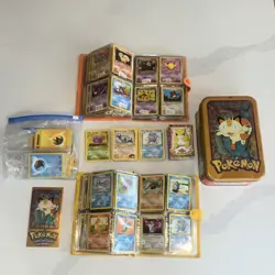 Pokemon Card Lot with Meowth Tin, Binders, Assorted Cards - Image 1