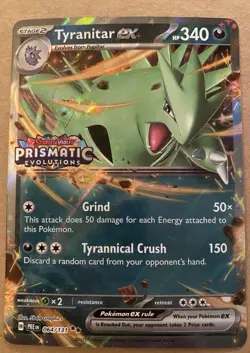 TYRANITAR EX 064/131 DOUBLE RARE PRISMATIC EVOLUTIONS POKEMON NM STAMPED - Image 1