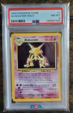 1999 POKEMON BASE SET UNLIMITED #1 ALAKAZAM-HOLO PSA 8 - Image 1