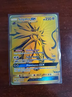 Pokemon - Solgaleo GX - Sun & Moon Promo SM104a - Gold Holo - Image 1