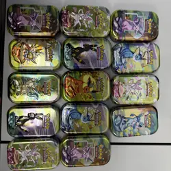 Prismatic Evolutions Tins - Set of 8 - Tins, Art Cards, and Coins only- No cards - Image 1