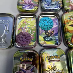 Prismatic Evolutions Tins - Set of 8 - Tins, Art Cards, and Coins only- No cards - Image 2