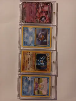 Lot Of 4 Encased Pokemon! 1st Edition Machamp Holo, 1st Edition Squirtle ... - Image 1