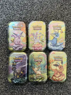 Pokemon TCG Prismatic Evolutions Mini Tins x6 - Brand new and Sealed - Image 1