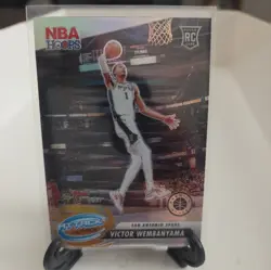 2023-24 Hoops Premium Stock - Attack the Rack Victor Wembanyama Silver Prizm RC - Image 1