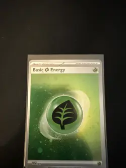 Pokemon TCG Basic Leaf Energy Cosmic Holo SVE 001 Pokemon 151 - Image 1