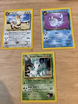Pokemon TCG Furret 35/111 Dark Vaporeon 45/82 Giovanni's Nidorina 44/132 Lot 3 - Image 1
