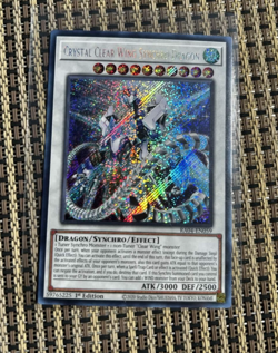 Yugioh Crystal Clear Wing Synchro Dragon RA04-EN059 1st Edition Secret Rare LP - Image 1