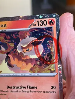 POKEMON FLAREON 013/131 RARE COSMOS HOLOFOIL SWIRL PRISMATIC EVOLUTIONS NM CARD - Image 2