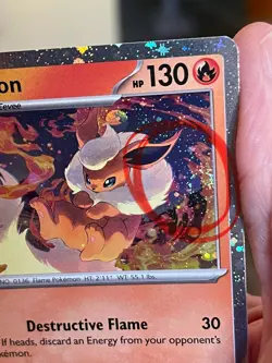 POKEMON FLAREON 013/131 RARE COSMOS HOLOFOIL SWIRL PRISMATIC EVOLUTIONS NM CARD - Image 3