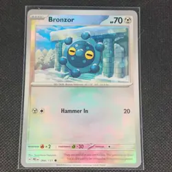 Bronzor - 066/131 - Masterball Holo - Prismatic Evolutions - Pokemon - NM/M - Image 1