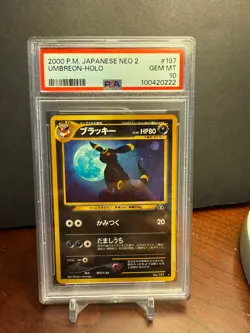 PSA 10 2000 Umbreon Holo Pokemon Card Japanese NEO 2 Discovery 197 GEM MT. Swirl - Image 1