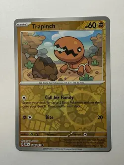 Trapinch - Reverse Holo - Surging Sparks SSP 104/191 Pokemon Card - Image 1