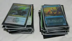 Lot of 109 Foil Magic The Gathering Cards in plastic sleeves - Image 1