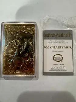 1999 Pokemon 23K Gold Plated Charizard Trading Card with Certificate and Case - Image 1