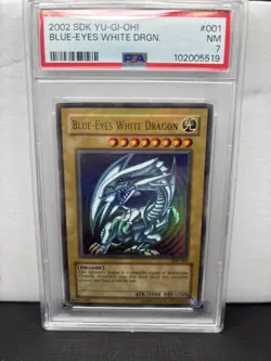 Blue-Eyes White Dragon 2002 Yu-Gi-Oh! SDK-001 PSA 7 full holo bleed error - Image 1