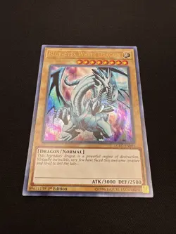 Yugioh Blue-Eyes White Dragon (Version 1) LCKC-EN001 LP 1st Edition - Image 1