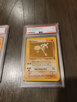 1999 Pokemon Fossil Hitmonlee Holo PSA 7 - Image 1