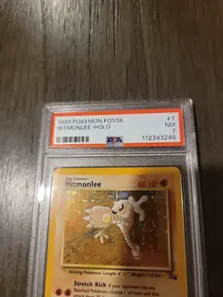 1999 Pokemon Fossil Hitmonlee Holo PSA 7 - Image 3