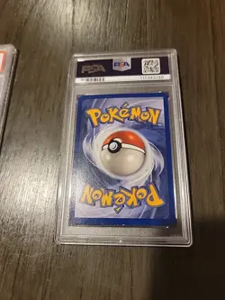 1999 Pokemon Fossil Hitmonlee Holo PSA 7 - Image 4
