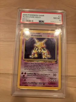 2000 POKEMON BASE SET 2 #1 ALAKAZAM-HOLO PSA 8 - Image 1