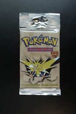 Pokemon Fossil Unlimited Booster Pack Long Crimp Zapdos Art (Mint) - Image 1