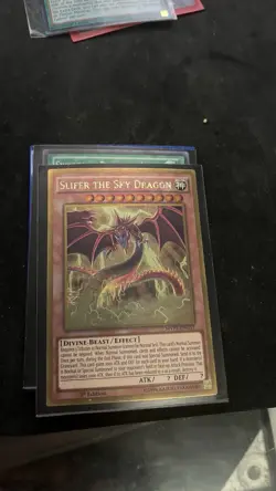 Slifer the Sky Dragon MVP1-ENG57 The Dark Side of Dimensions Movie Pack Gold LP - Image 1