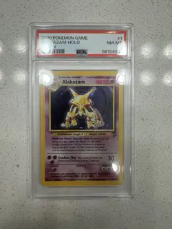 1999 Pokemon Alakazam Base Set 2 1/130 Unlimited Holo Rare PSA 8 Card - Image 1