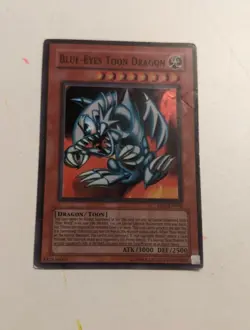 Blue eyes toon dragon DB1 super rare Yu-Gi-Oh card - Image 1
