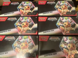 Case Lot of SIX (6) Sealed Pokemon Prismatic Evolution Surprise Boxes! In Hand! - Image 1