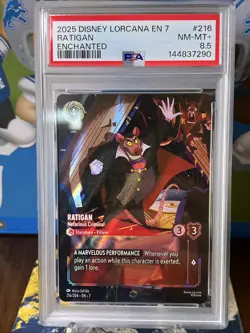 2025 DISNEY LORCANA EN 7-ARCHAZIA'S ISLAND RATIGAN ENCHANTED PSA 8.5 NM-MT+ - Image 1