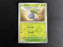 Pokemon TCG SV3 Obsidian Flames 001/197 Oddish Rev Holo Card - Image 1