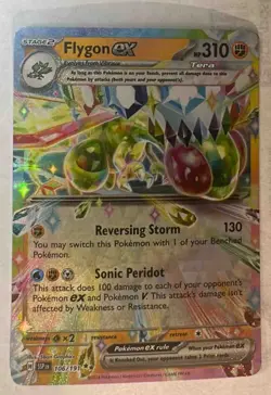 2024 Pokemon Surging Sparks Flygon Ex #106/191 - Image 1