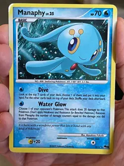 POKEMON MANAPHY LV.25 3/17 POP SERIES 9 RARE COSMOS HOLO WITH PART OF SWIRL MP - Image 1