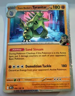 Team Rocket's Tyranitar 2025 (Cosmos Holo) Pokemon Card No 096/182 - Image 1