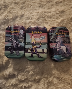 Pokemon Set of 3 tins with no packs no coins - Image 1