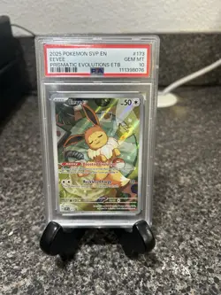 Pokemon Prismatic Evolutions Eevee Promo Card 2025 SVP en 173 PSA 10 Gem MT - Image 1