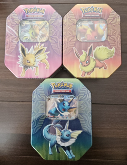 Pokemon Elemental Powers GX Tins JOLTEON FLAREON VAPOREON ( FULL SET ) - Image 1