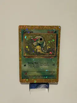 Caterpie 45/102 Base Set Vending Sticker Holo Prism Pokemon Card - Image 1