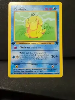 Psyduck 65/82 1st Edition NM Team Rocket Non-Holo Pokemon - Image 1