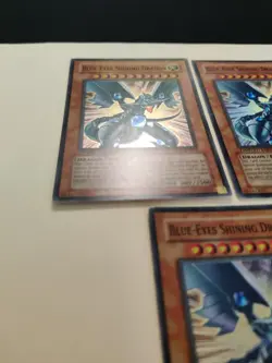 3x Yugioh! Blue-Eyes Shining Dragon MOV-EN001 Super Rare Promo LP/MP - Image 4