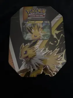 Pokemon TCG Jolteon V Eevee Evolutions Tin Sealed - Image 1